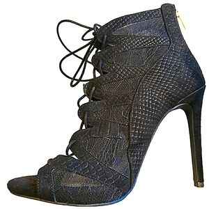 Jessica Simpson Black Heels with Intricate Cutout Design